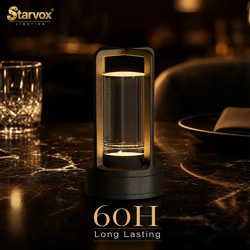 wireless table lamp with translucent glass and brass base for luxury hotel dining